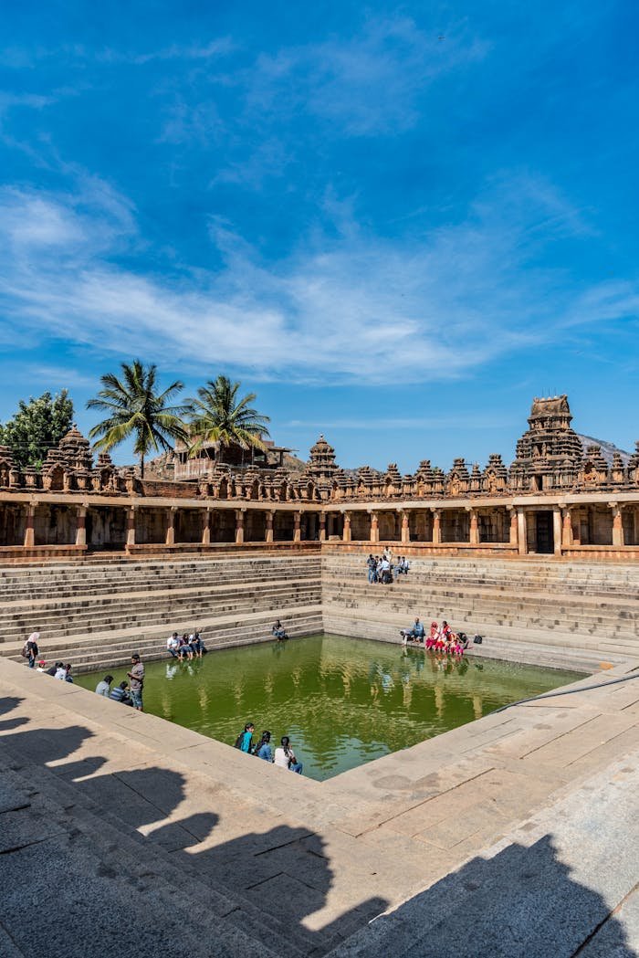 Discover the serene beauty of Bhoga Nandeeshwara Temple featuring a historic water pond in Nandi, India.